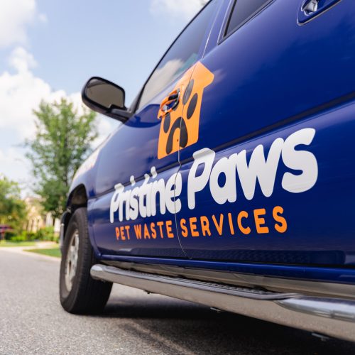 A side photo of Pristine Paws company vehicle.
